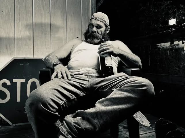 Black-and-white still from Holler