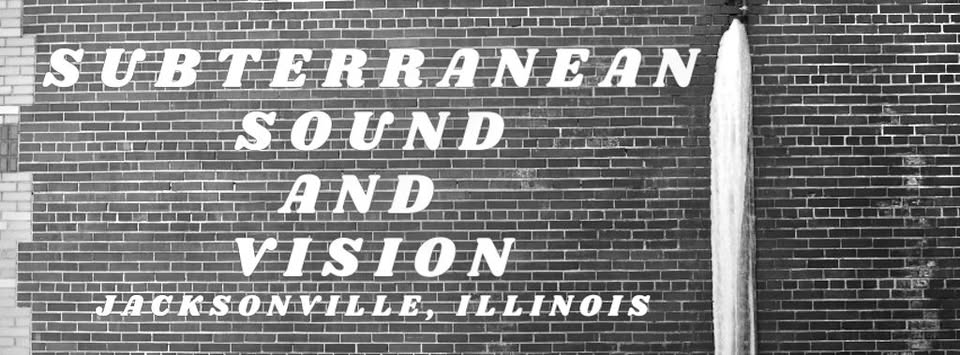 Subterranean Sound and Vision lettering on a brick wall